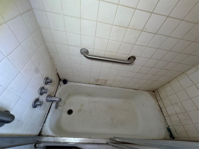 bathroom with walk in shower and a tub to relax in