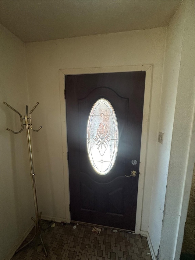 foyer with baseboards