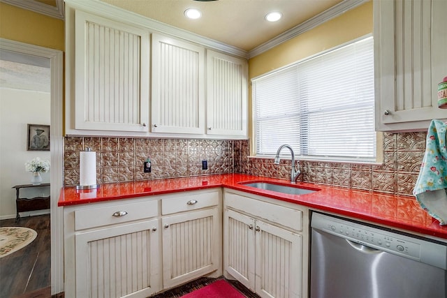 kitchen featuring a sink, decorative backsplash, and stainless steel dishwasher