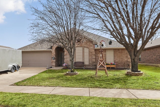 ranch-style house featuring a garage, a front lawn, brick siding, and driveway