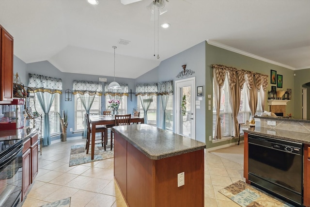 kitchen with dark countertops, visible vents, vaulted ceiling, light tile patterned floors, and black appliances