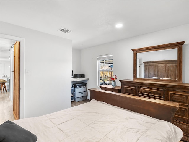 bedroom with visible vents