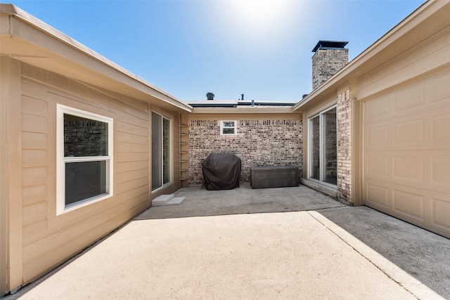 view of patio / terrace featuring a grill