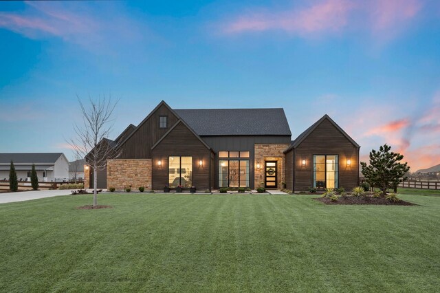 900 Sutherland Cres, Northlake, TX 76247 - view of front of property with stone siding, a front yard, a garage, and board and batten siding