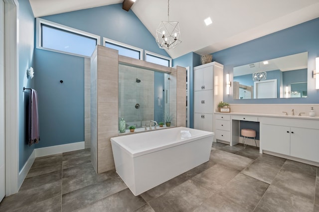 900 Sutherland Cres, Northlake, TX 76247 - full bath with a chandelier, vanity, a soaking tub, a shower stall, and high vaulted ceiling