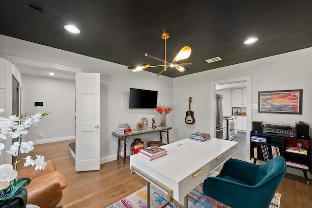 home office featuring visible vents, baseboards, light wood-type flooring, recessed lighting, and a notable chandelier