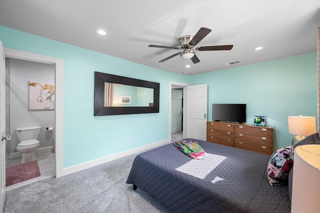 carpeted bedroom featuring baseboards, visible vents, recessed lighting, ceiling fan, and ensuite bathroom