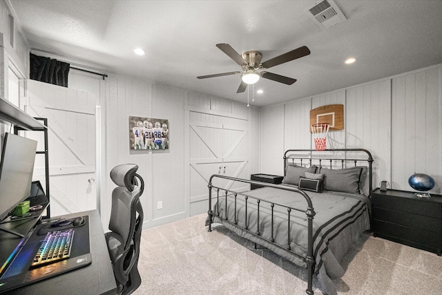 carpeted bedroom featuring recessed lighting, visible vents, and ceiling fan