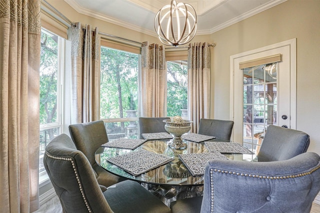 dining area with a chandelier and ornamental molding