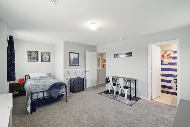 carpeted bedroom with tile patterned floors