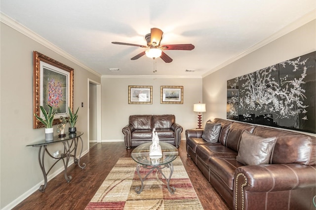 living area featuring baseboards, a ceiling fan, wood finished floors, and crown molding