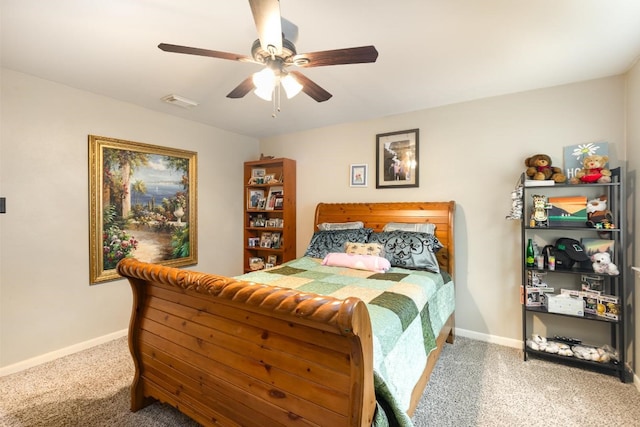 bedroom featuring visible vents, carpet, baseboards, and ceiling fan