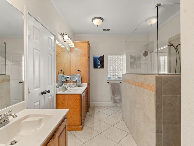 full bathroom featuring a sink, visible vents, walk in shower, and crown molding