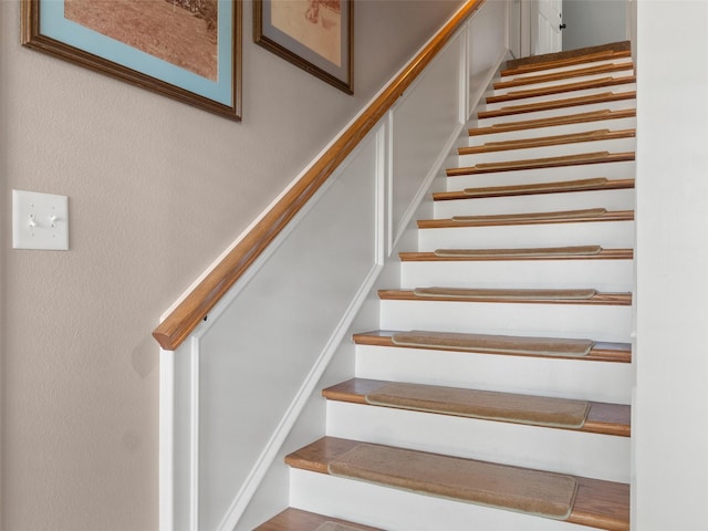 stairs with a textured wall