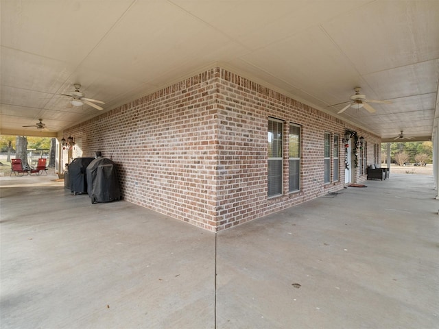 view of patio / terrace with a grill and ceiling fan