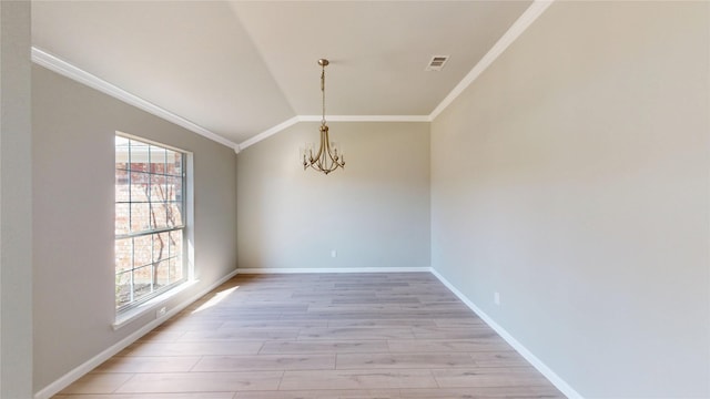 empty room with lofted ceiling, light wood-type flooring, crown molding, and an inviting chandelier