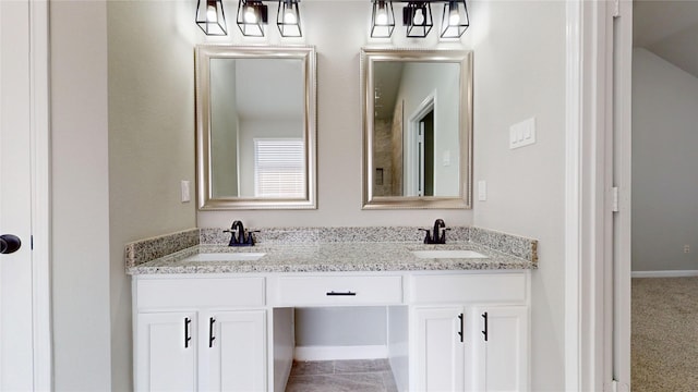 full bath featuring a sink and double vanity