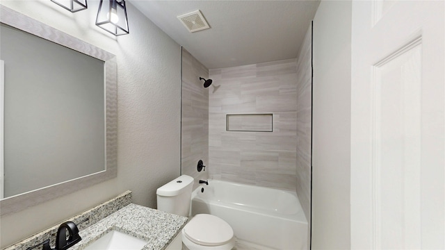 full bathroom with shower / tub combination, toilet, a textured wall, and visible vents