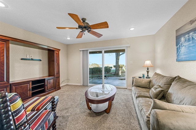 living room with ceiling fan, recessed lighting, baseboards, and light carpet