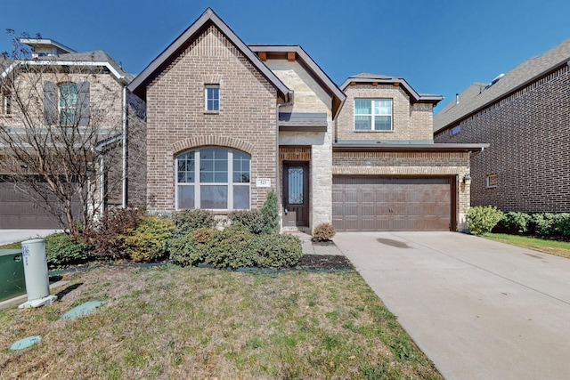 view of front facade featuring brick siding, driveway, and an attached garage