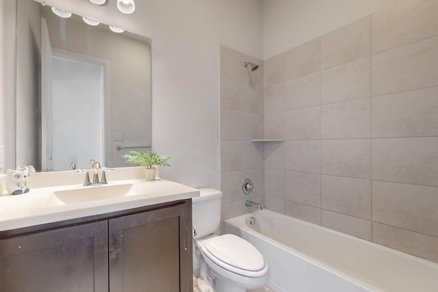 full bath featuring toilet, shower / washtub combination, and vanity