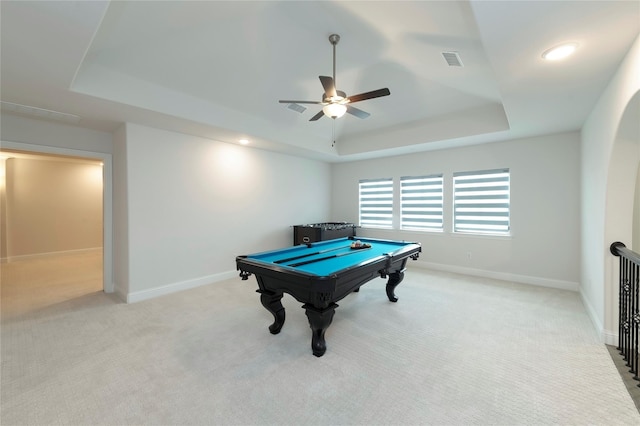 playroom featuring a tray ceiling, baseboards, and visible vents