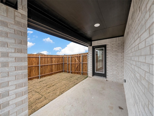 view of patio with fence