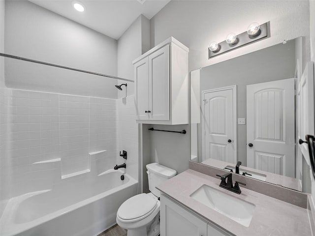 full bathroom featuring toilet, bathtub / shower combination, and vanity