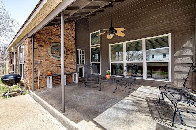 view of patio / terrace featuring grilling area and a ceiling fan