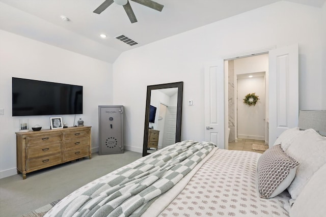 carpeted bedroom featuring baseboards, visible vents, ceiling fan, vaulted ceiling, and connected bathroom