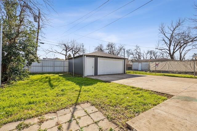 detached garage with fence