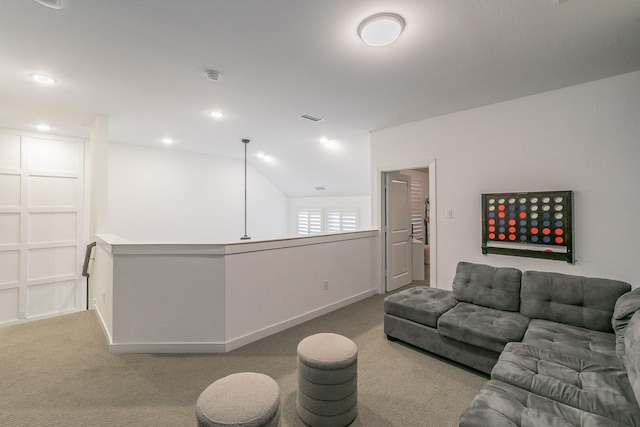 living area with visible vents, recessed lighting, baseboards, and carpet