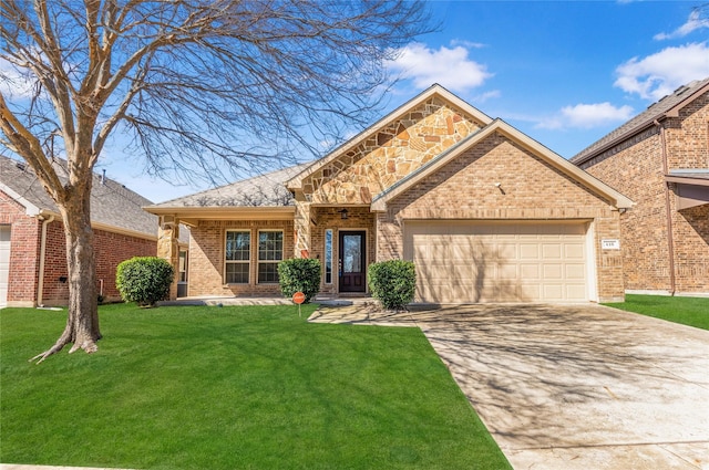 view of front of home with driveway, stone siding, an attached garage, a front yard, and brick siding