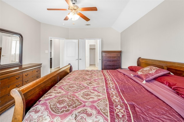 bedroom featuring visible vents, a ceiling fan, and lofted ceiling