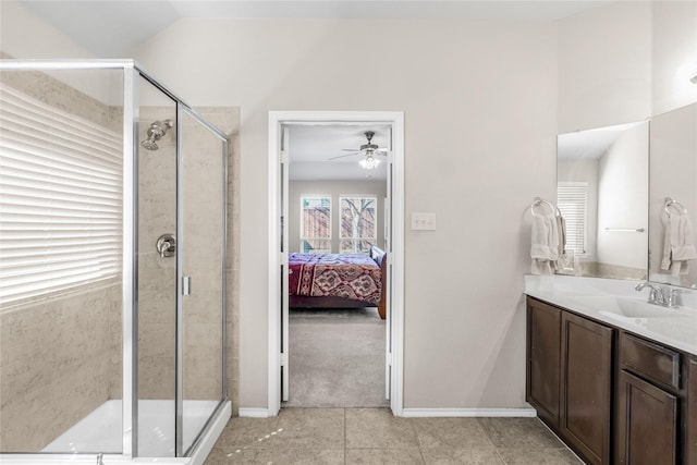 bathroom featuring ensuite bath, a shower stall, vanity, and tile patterned floors