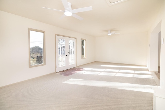 2016 China, Brady, TX 76825 - empty room with french doors, ceiling fan, and light colored carpet