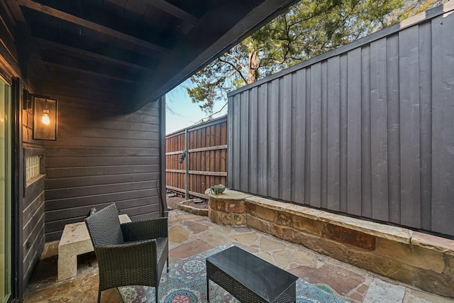 view of patio with fence