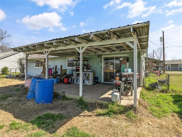 view of patio featuring fence