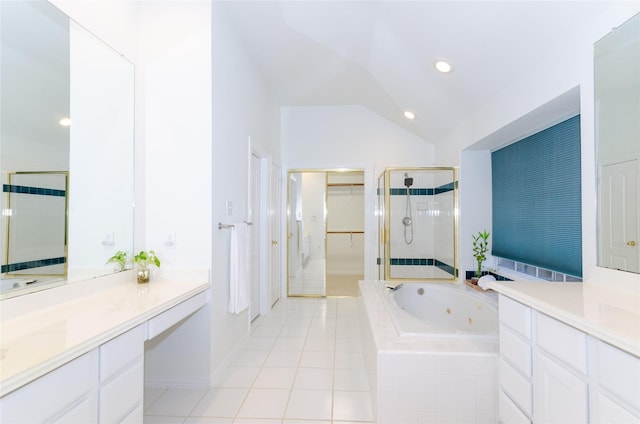 full bathroom with a jetted tub, a shower stall, tile patterned flooring, lofted ceiling, and a spacious closet