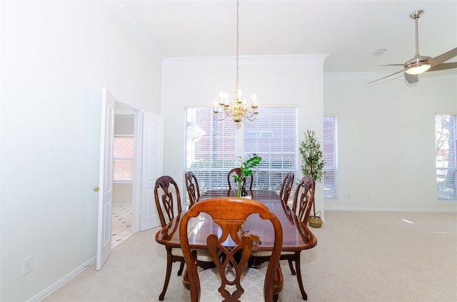 dining space featuring visible vents, light carpet, baseboards, and crown molding