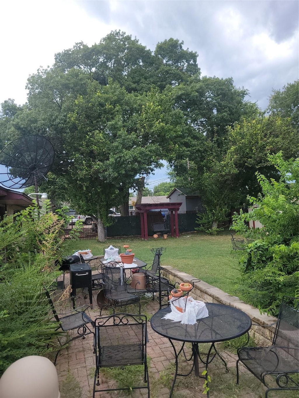 view of patio / terrace with outdoor dining space and fence