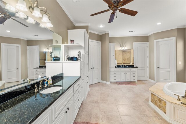 full bathroom with two vanities, ornamental molding, a ceiling fan, a sink, and tile patterned flooring