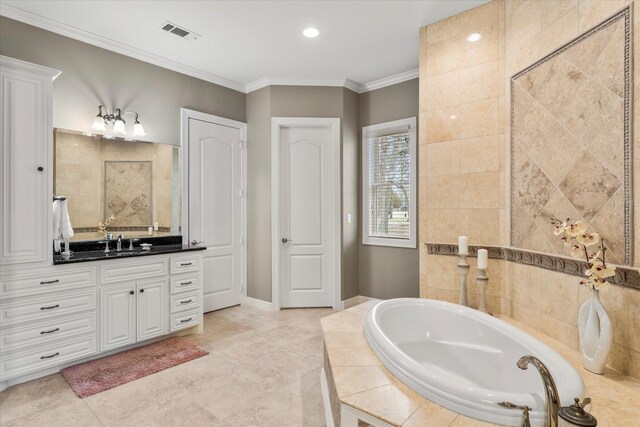 full bathroom with visible vents, crown molding, baseboards, a bath, and vanity