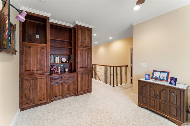 interior space with crown molding, recessed lighting, baseboards, and light carpet