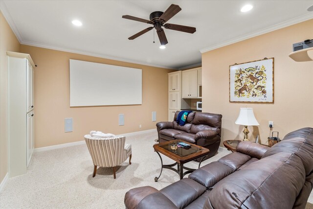 living area with crown molding, baseboards, ceiling fan, light colored carpet, and recessed lighting