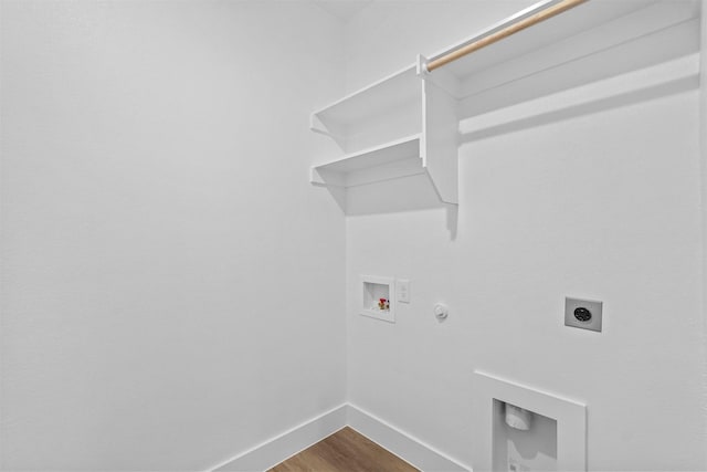 washroom featuring baseboards, laundry area, electric dryer hookup, washer hookup, and dark wood-type flooring