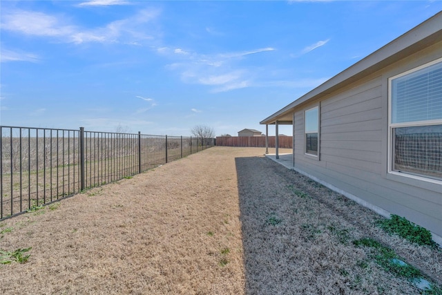 view of yard featuring a fenced backyard