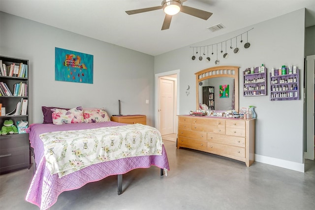 bedroom featuring visible vents, baseboards, finished concrete floors, and a ceiling fan