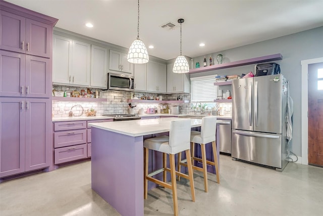 kitchen with visible vents, open shelves, finished concrete flooring, appliances with stainless steel finishes, and light countertops