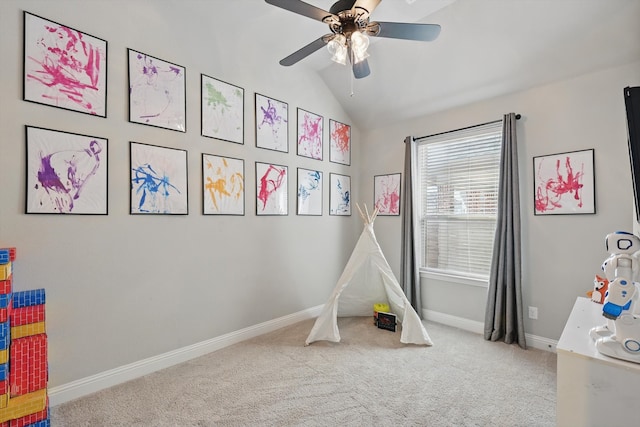 recreation room with lofted ceiling, a ceiling fan, baseboards, and carpet floors